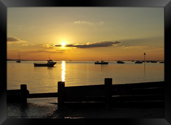 Sunset over the sea at Thorpe Bay, Essex, UK Framed Print by Peter Bolton