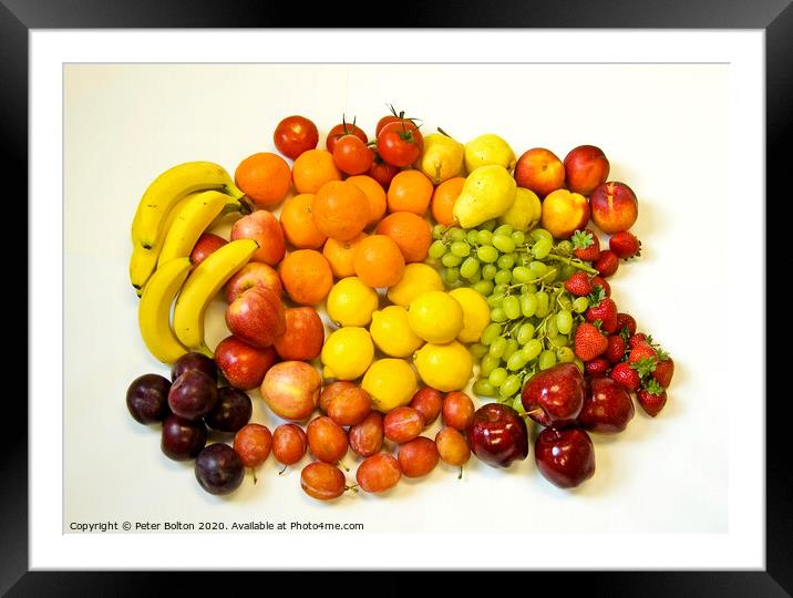 Still life of fresh fruits arranged as graphic design on a white background Framed Mounted Print by Peter Bolton