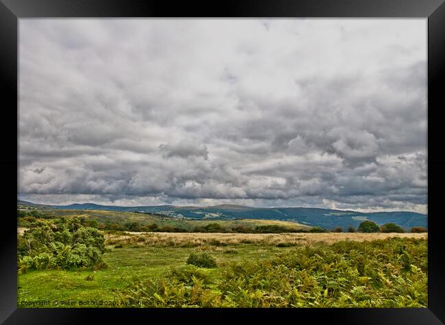 Dartmoor landscape with rainclouds, Devon, UK. Framed Print by Peter Bolton