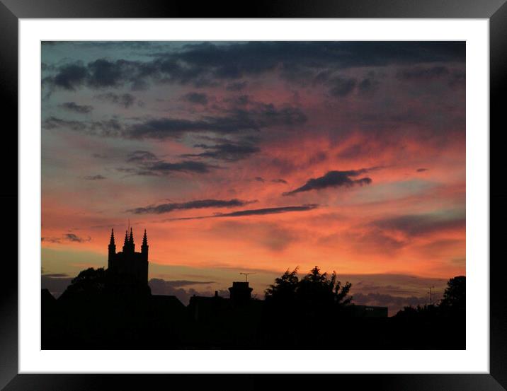 Nature puts on a light show at sunset. Prittlewell, Southend on Sea, Essex, UK. Framed Mounted Print by Peter Bolton