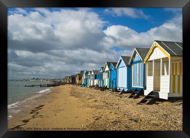Beach huts at Thorpe Bay, Thames Estuary, Essex, UK Framed Print by Peter Bolton