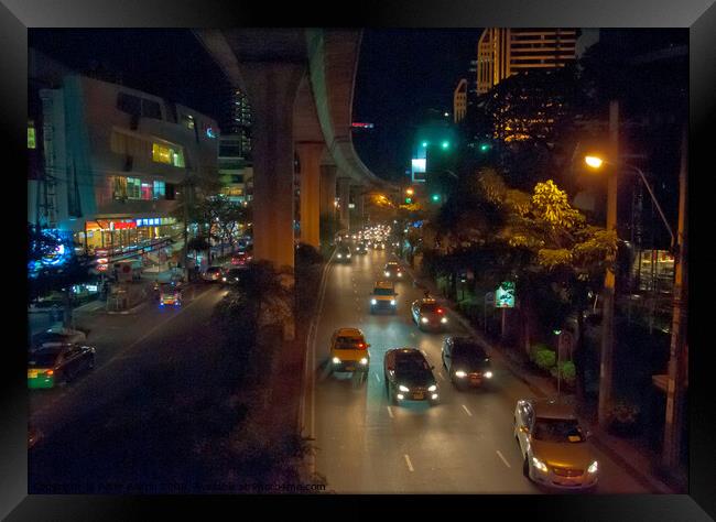 Night view in central Bangkok Framed Print by Peter Bolton