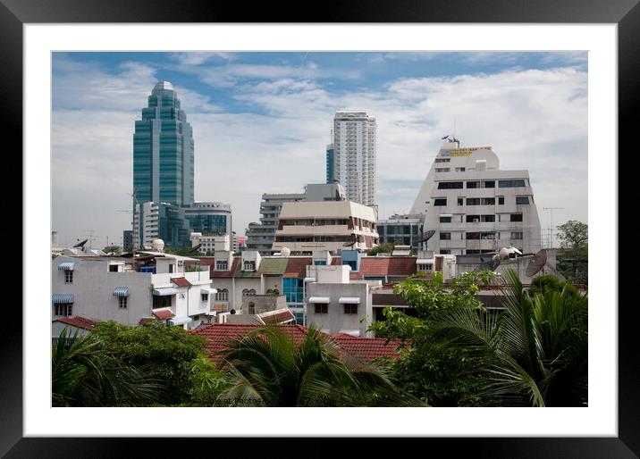 Cityscape of Bangkok, Thailand, showing dwellings and high rise buildings. Framed Mounted Print by Peter Bolton