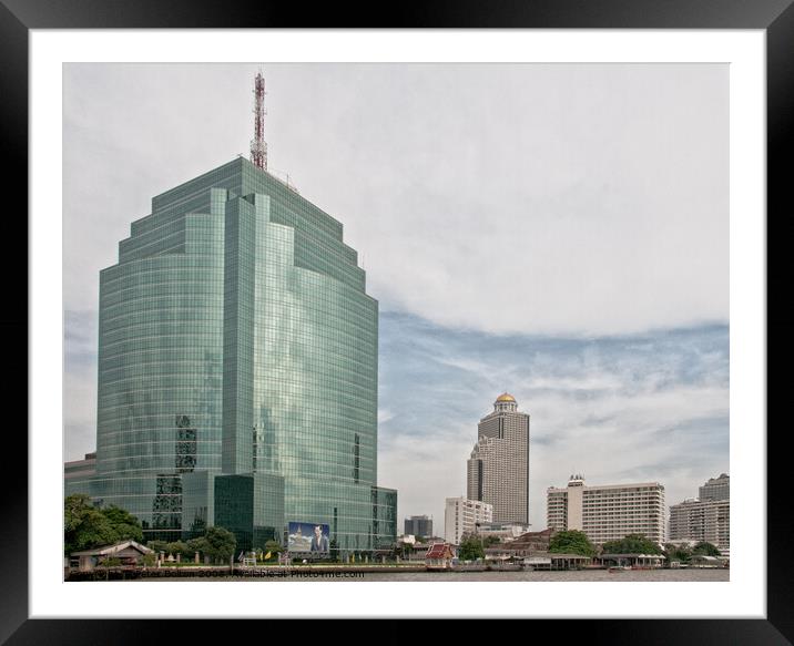 Glass and steel office building in Bangkok, Thailand. Framed Mounted Print by Peter Bolton