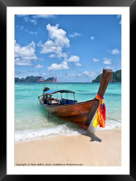 Long-tail boat pulled up on the beach, Phi Phi Island, Thailand. Framed Mounted Print by Peter Bolton