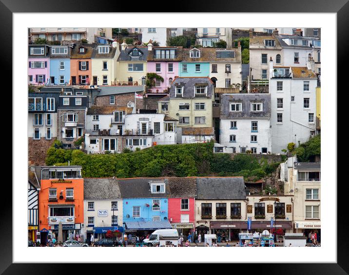 Detail of some of the colourful houses surrounding the harbour in Brixham, Devon, UK. Framed Mounted Print by Peter Bolton