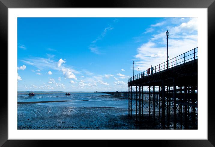 Looking along Southend Pier from the shore towards the pier head. Southend on Sea, Essex, UK.  Framed Mounted Print by Peter Bolton