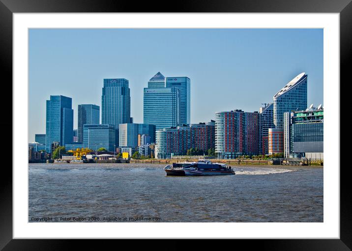 Canary Wharf Business District from the River Thames, London, UK. Framed Mounted Print by Peter Bolton