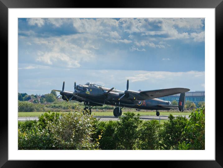 Canadian Lancaster Bomber 'Vera' at Southend Airport in 2014. Framed Mounted Print by Peter Bolton