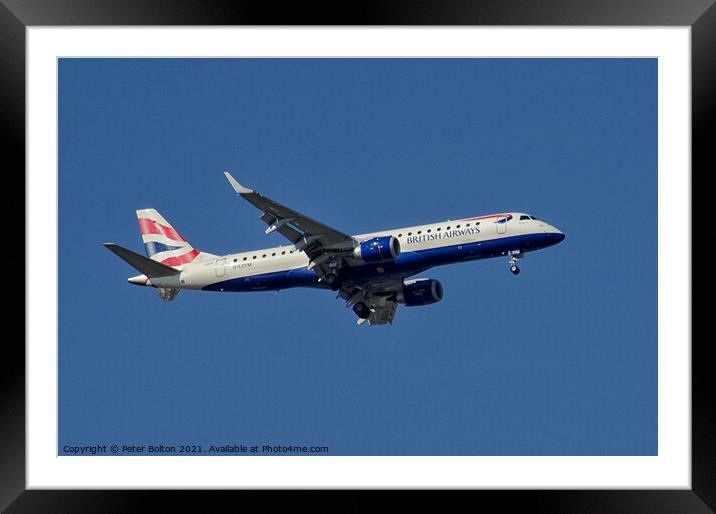 The Embraer 170 - BA City Flyer over London City A Framed Mounted Print by Peter Bolton