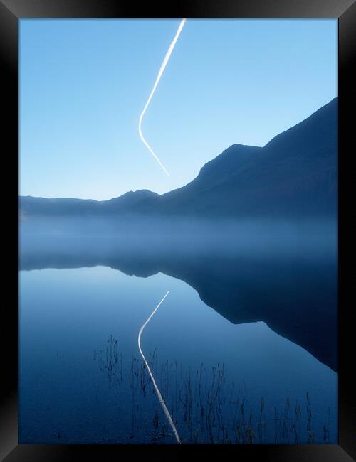 Contrail reflected in Buttermere Framed Print by Chester Tugwell