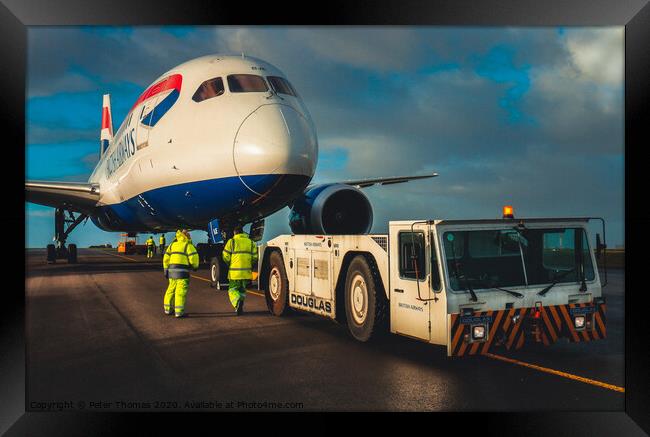787 dreamliner and tow team Framed Print by Peter Thomas