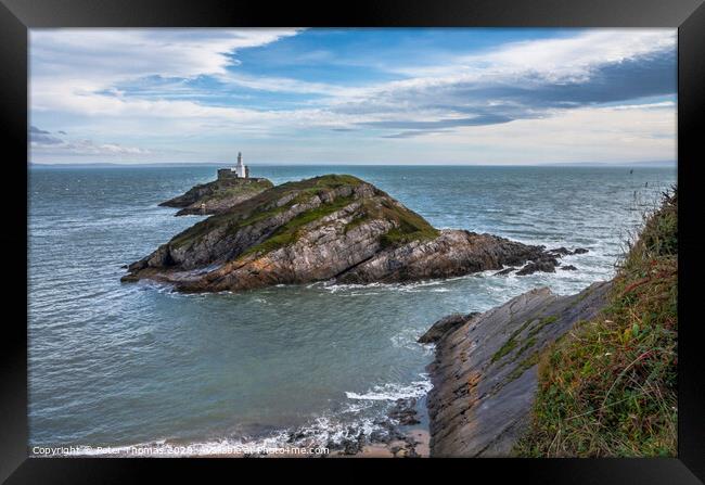 The Mumbles Lighthouse Framed Print by Peter Thomas