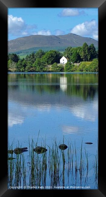 View Across Loch Alvie to the Church Framed Print by Charles Kelly