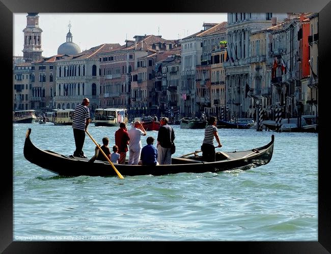 Taking the Gondola taxi across the Grand Canal Framed Print by Charles Kelly