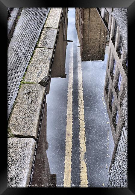 Road Puddle Framed Print by Kevin Plunkett