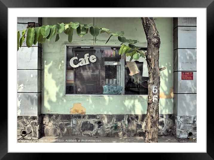 Abandoned street Cafe Framed Mounted Print by Kevin Plunkett