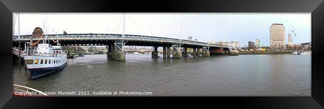 Hungerford Bridge and Golden Jubilee Bridges. River Thames Framed Print by Kevin Plunkett