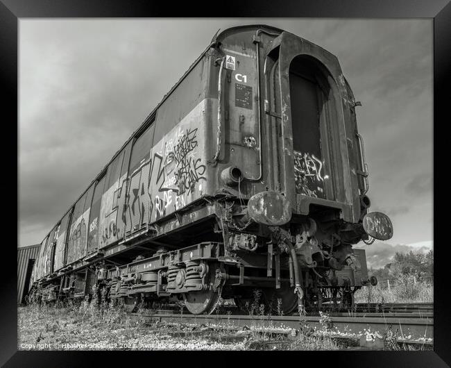 Rusting Abandoned Railway Carriage with Graffiti Framed Print by Heather Sheldrick