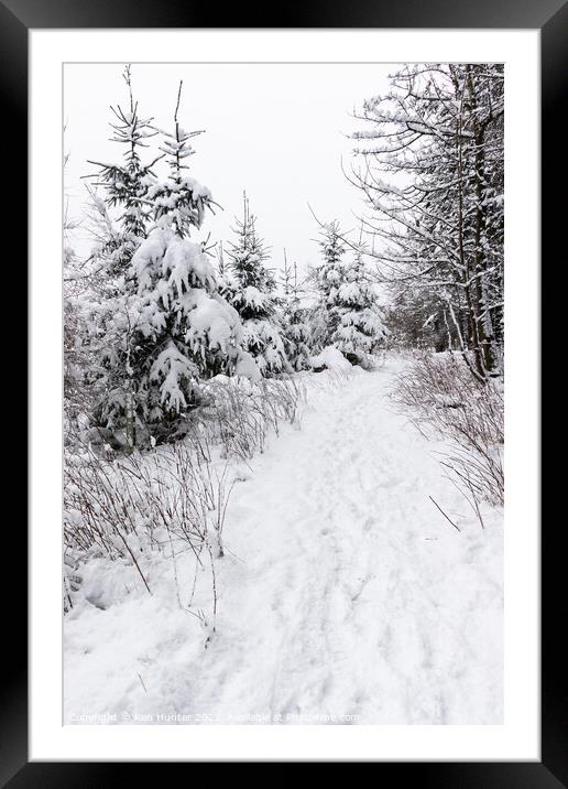 Scottish Winter Wonderland Trek Framed Mounted Print by Ken Hunter