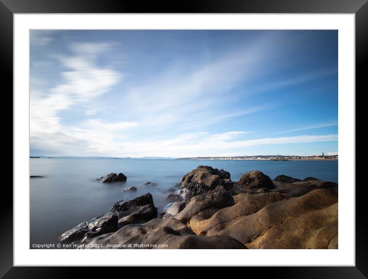 Moody Foreshore Framed Mounted Print by Ken Hunter