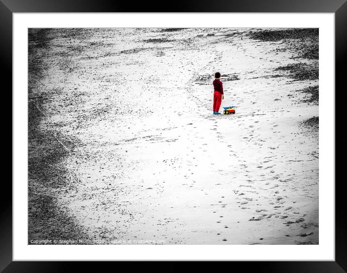 Boy on the beach Framed Mounted Print by Stephen Munn