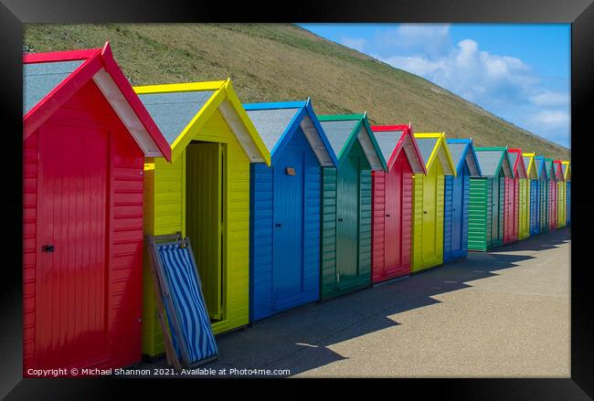 Row of Beach Huts at Whitby Framed Print by Michael Shannon