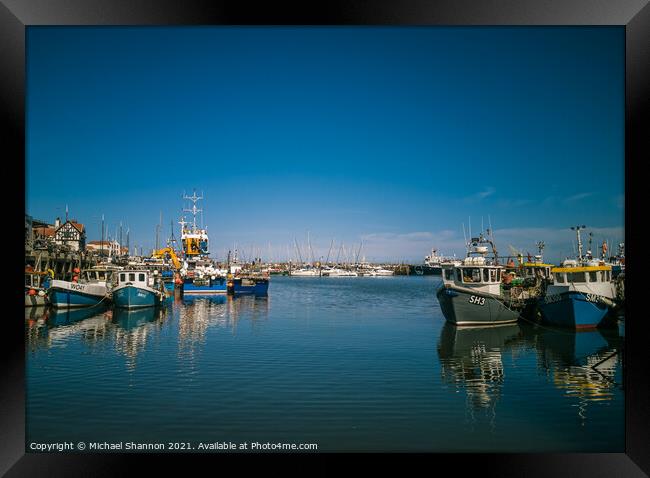 Boats moored in Scarborough Harbour Framed Print by Michael Shannon