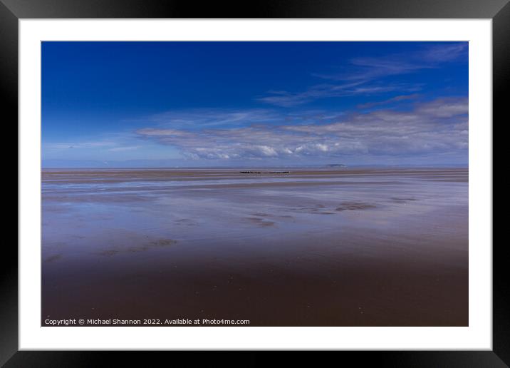 The endless beach at Berrow near Burnham-on-Sea in Framed Mounted Print by Michael Shannon