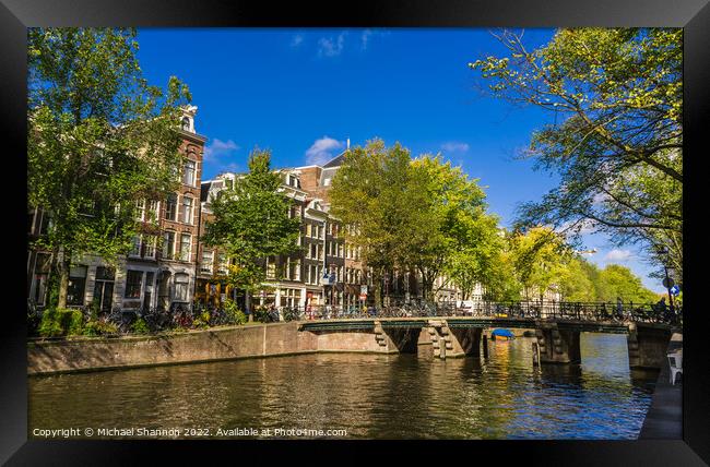 City Street and Canal Amsterdam, Netherlands Framed Print by Michael Shannon