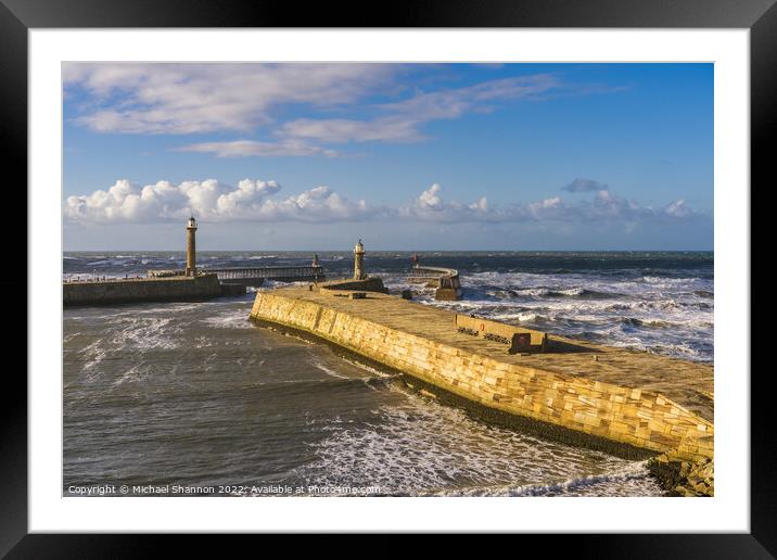 Clifftop view of the East Pier in Whitby, North Yo Framed Mounted Print by Michael Shannon
