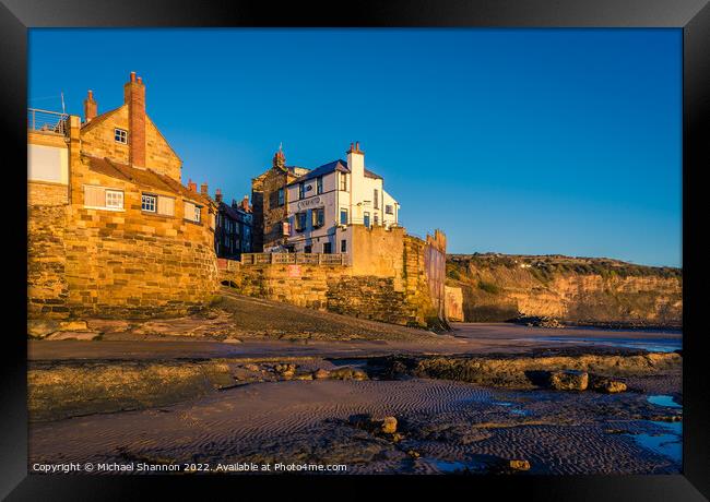 Robin Hoods Bay shot from the beach at low tide. Framed Print by Michael Shannon