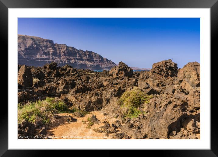 Beach path from Orzola which navigates a rocky tra Framed Mounted Print by Michael Shannon