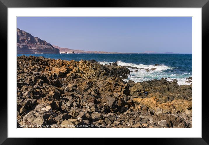 The wild rocky coastline near Orzola in Northern L Framed Mounted Print by Michael Shannon