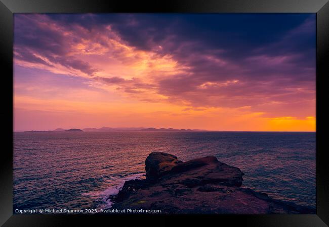 Looking out to sea at Sunset, Playa Blanca, Lanzar Framed Print by Michael Shannon