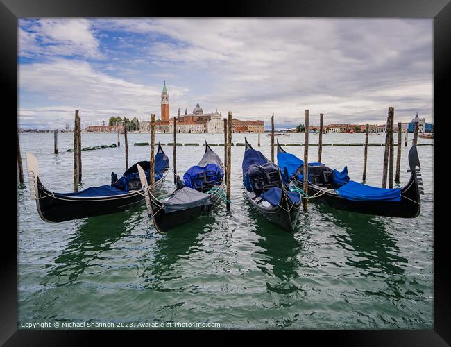 Gondolas moored near St Marks Square, Venice Framed Print by Michael Shannon