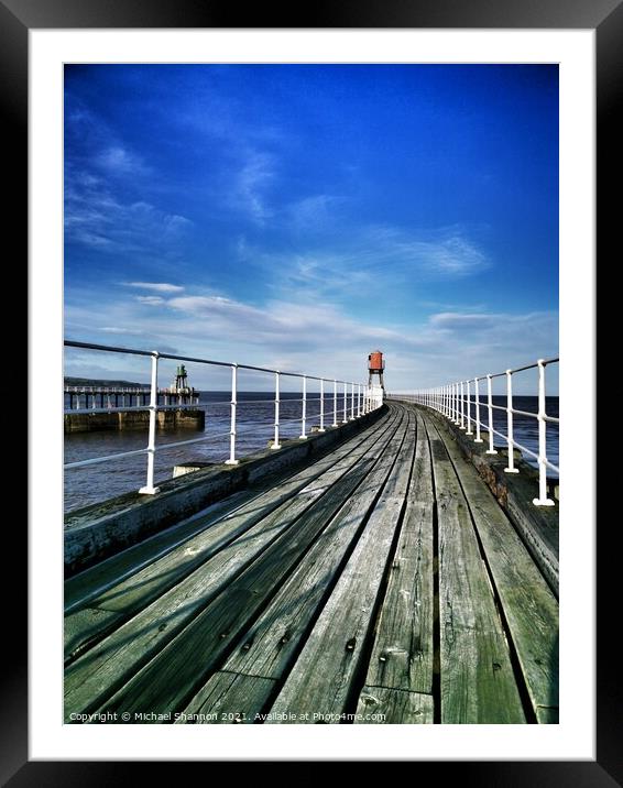 View along the East Pier at Whitby, North Yorkshir Framed Mounted Print by Michael Shannon