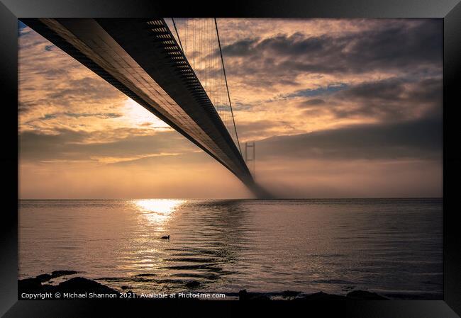Sunrise Humber Bridge in Humberside. Framed Print by Michael Shannon
