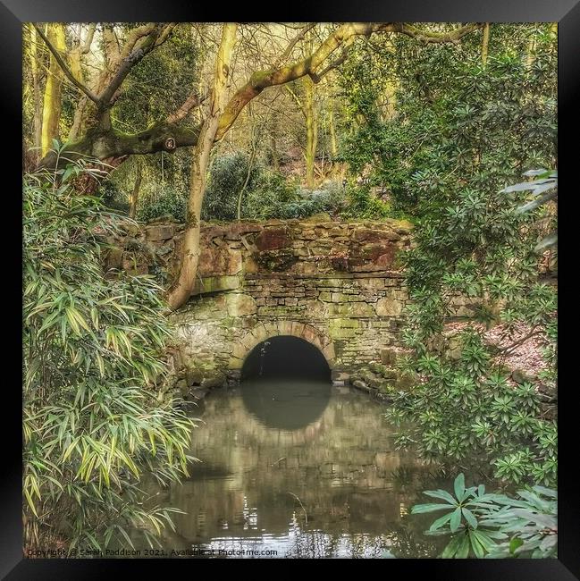 Reflection of a bridge in a calm stream Cheethams Park Stalybridge Framed Print by Sarah Paddison