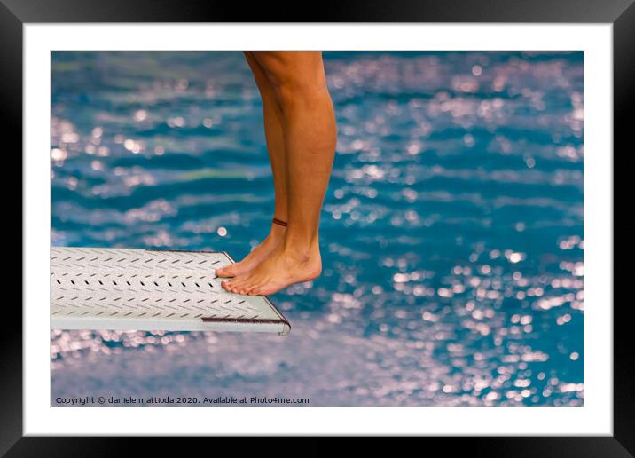 dive from diving board Framed Mounted Print by daniele mattioda
