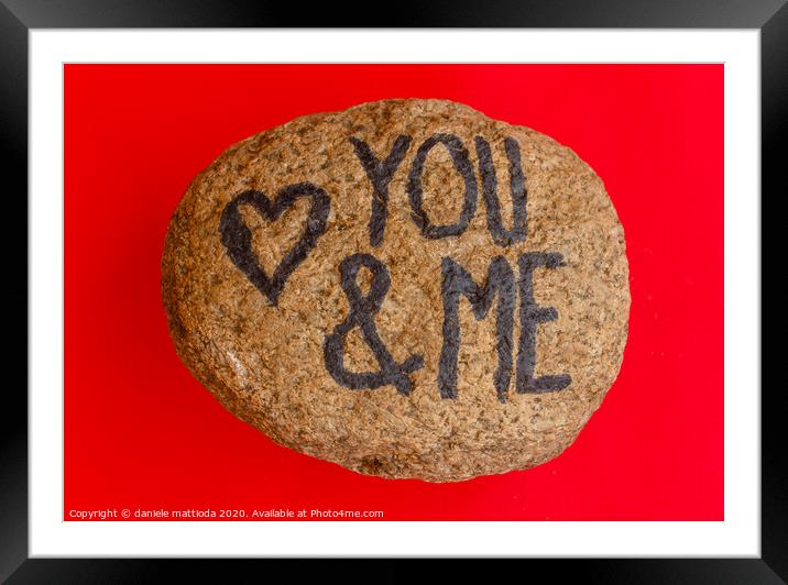 the english  writing you and me with a heart drawn Framed Mounted Print by daniele mattioda