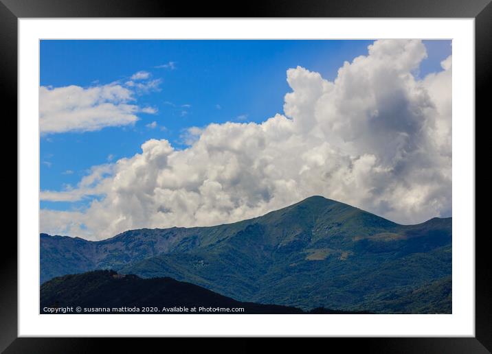 a landscaping symmetry of mountains and clouds Framed Mounted Print by susanna mattioda