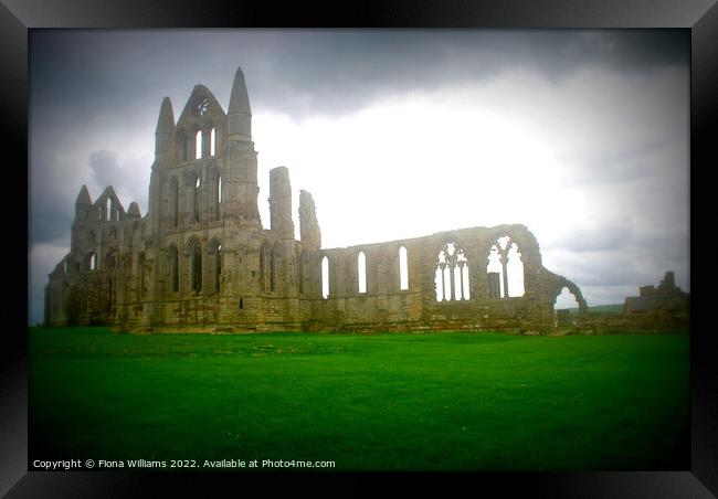 Whitby Abbey ruins on a cloudy day Framed Print by Fiona Williams
