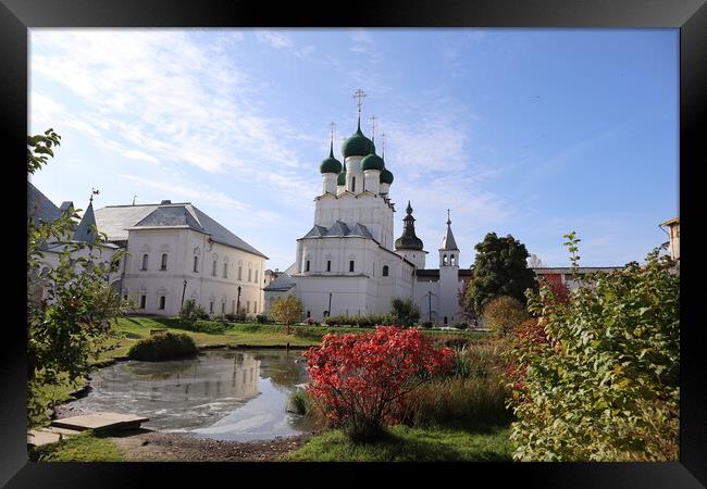 Beautiful white Christian Church with blue sky bac Framed Print by Karina Osipova