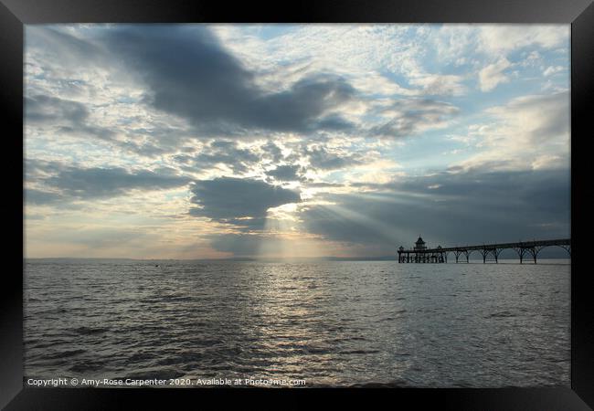 Sun setting over Bristol sea in view of Clevedon p Framed Print by Amy-Rose Carpenter