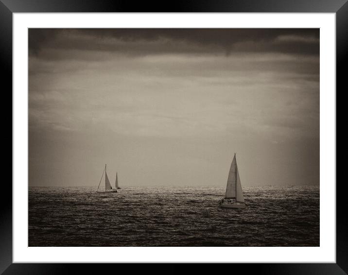 Sailing along the coast of Barcelona Framed Mounted Print by JM Ardevol