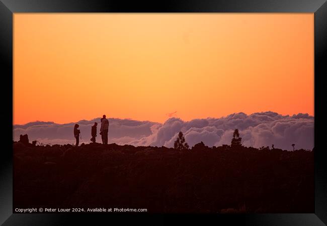 Sunset above the clouds Framed Print by Peter Louer