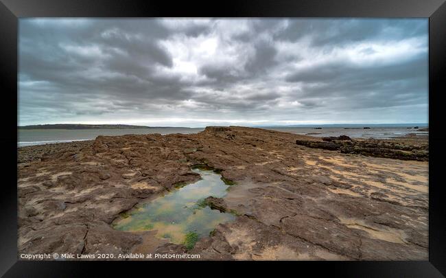 The Rock pool Framed Print by Malc Lawes