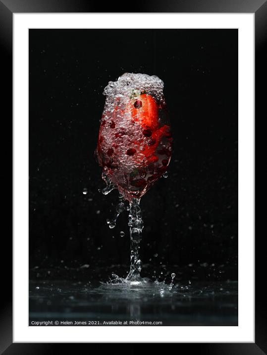 A glass of fizzy water and fruit Framed Mounted Print by Helen Jones