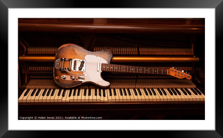Vintage Fender Telecaster electric guitar on piano Framed Mounted Print by Helen Jones